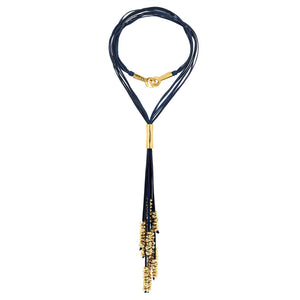Akna . Fabulous long tie necklace with11 Threads of leather, Japanese perals and gold seeds.