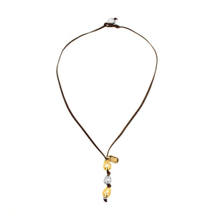 Brahma. A summer must have leather necklace and metal pearls pendant.