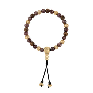 Japa Mala Stone. Inspired by acnient Tibetan mantras, our Japa Mala bracelet is made from ebony wood and volcanic stone. It has been used since ancient times for the manufacture of amulets, ornaments and relics as a symbol of good luck and protection od homes.